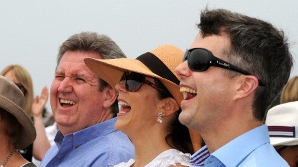 Denmark's Princess Mary (second right) and her husband Crown Prince Frederik (right)