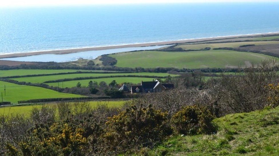 View over Swyre Road to West Bexington Nature Reserve