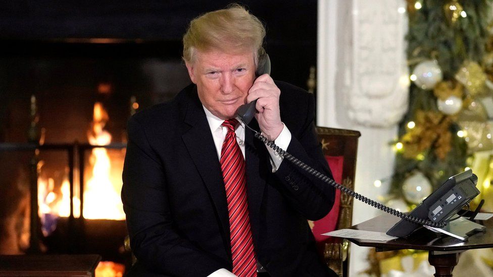 U.S. President Donald Trump participates in NORAD Santa tracker phone calls