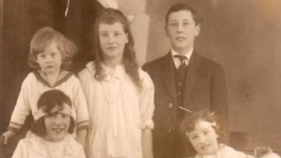 Black and white photo of five children