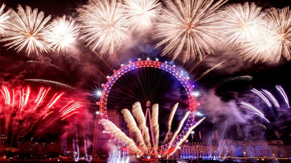 Fireworks surrounded the London Eye during New Year celebrations