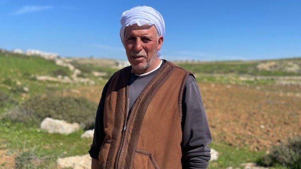 Fares Samamreh, Palestinian sheep farmer stands in the South Hebron Hills, in the occupied West Bank