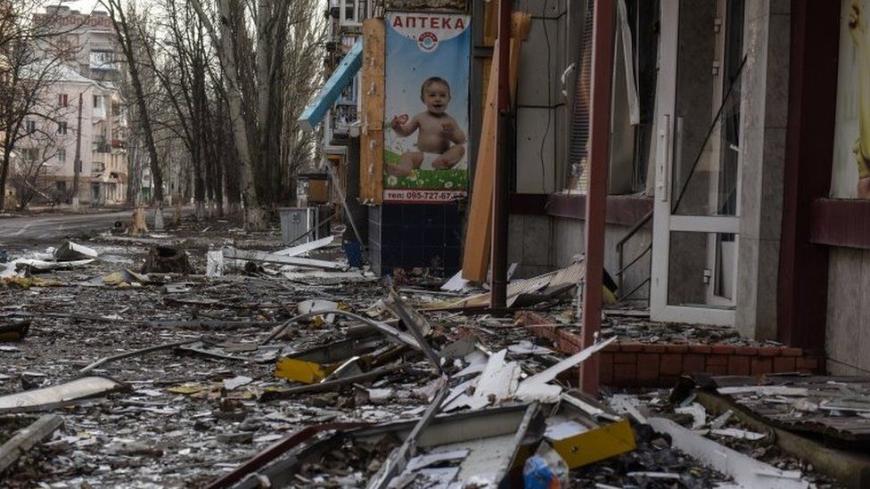 A photo of a child at destroyed pharmacy in the city of Bakhmut, eastern Ukraine. Photo: January 2023
