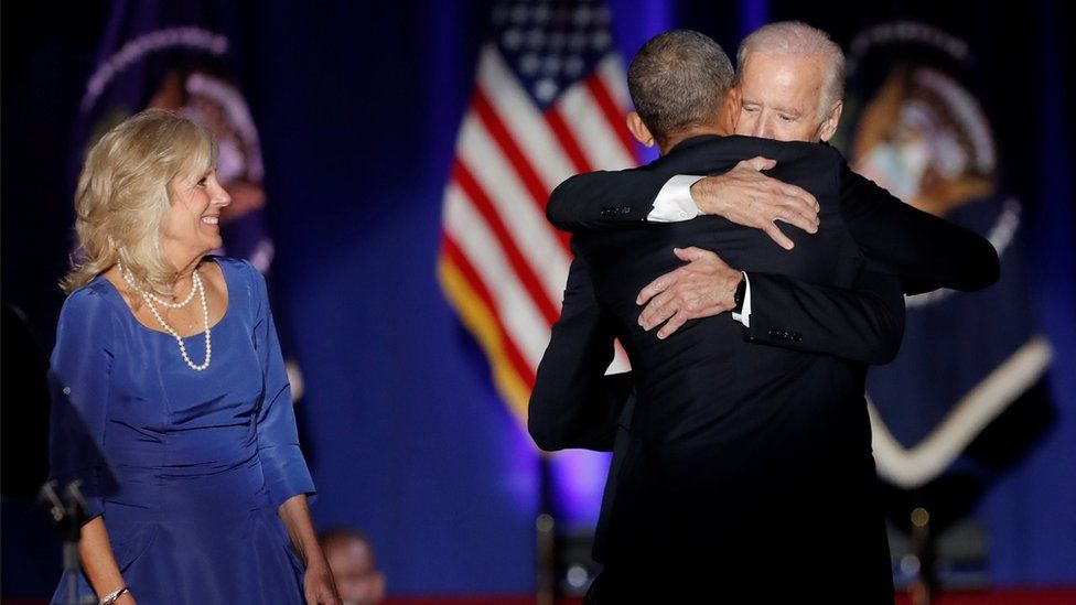 U.S. President Barack Obama hugs Vice-President Joe Biden as Biden"s wife Jill looks on after Obama delivered a farewell address at McCormick Place in Chicago, Illinois, U.S. January 10, 2017