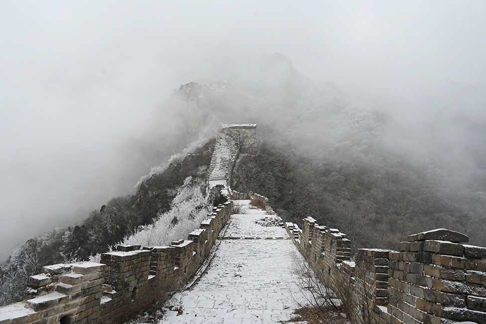 The Great Wall of China is seen after a light snowfall at Jiankou, north of Beijing on 9 January 2022
