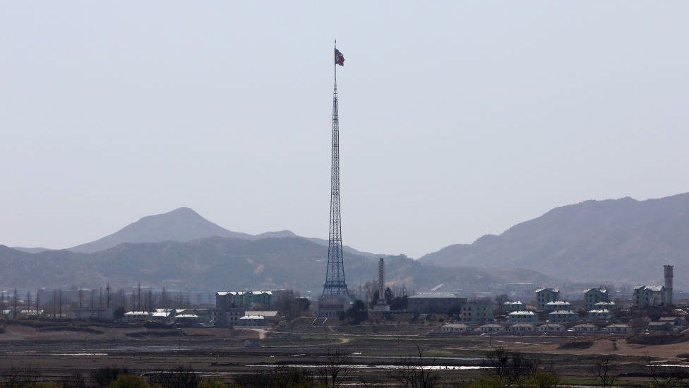 A North Korean national flag in North Korea's propaganda village of Gijungdong is seen from an observation post on April 11, 2018 in Panmunjom