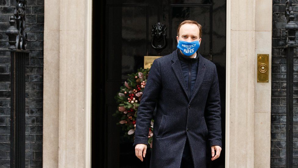 Matt Hancock wears a Protect the NHS mask outside No10