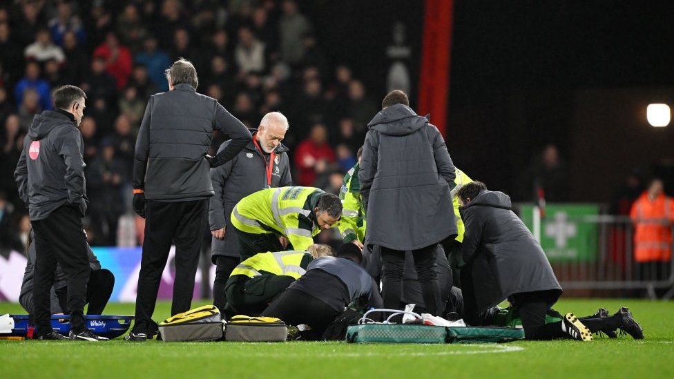 Tom Lockyer after suffering cardiac arrest on the pitch