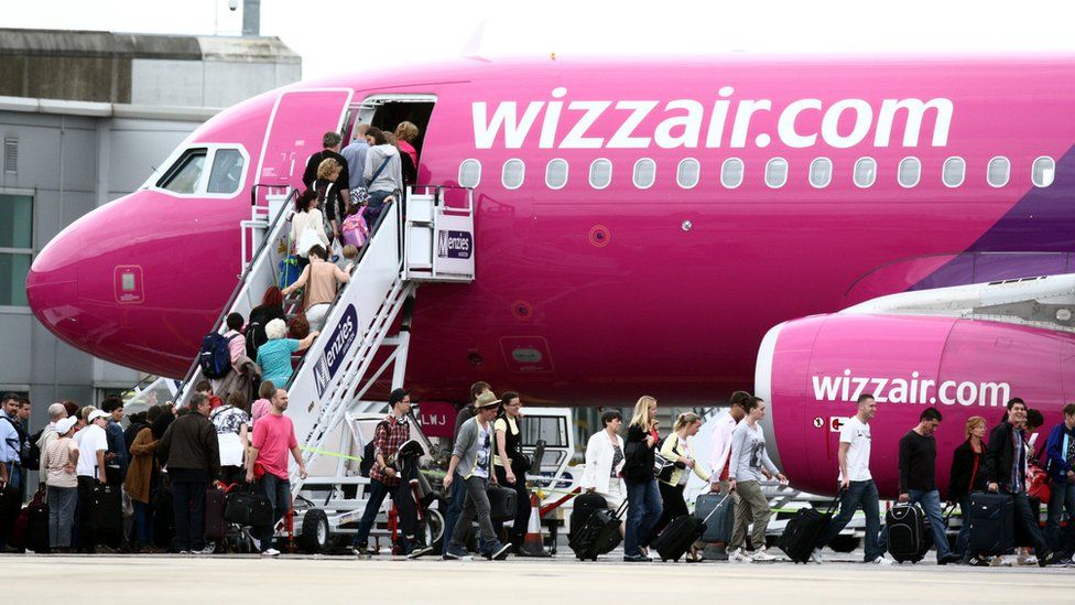 Passengers boarding a Wizz Air flight at Luton Airport