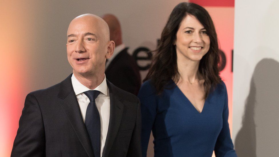 Amazon CEO Jeff Bezos and his wife MacKenzie Bezos arrive at the headquarters of publisher Axel-Springer where he will receive the Axel Springer Award 2018 on April 24, 2018 in Berlin.