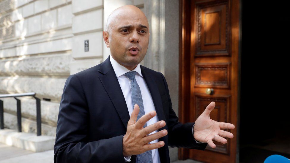 New Chancellor Sajid Javid outside the Treasury on his first day in the job