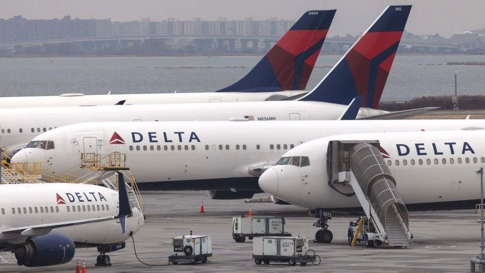 four Delta planes at JFK airport in New York