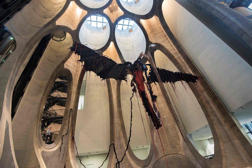 This file photo taken on September 15, 2017 shows a sculpture by South African artist Nicholas Hlobo dominating the main hall in The Zeitz Museum of Contemporary African Art in Cape Town.