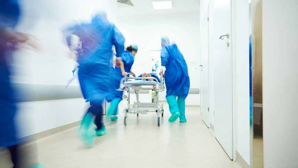 Medics in hospital corridor