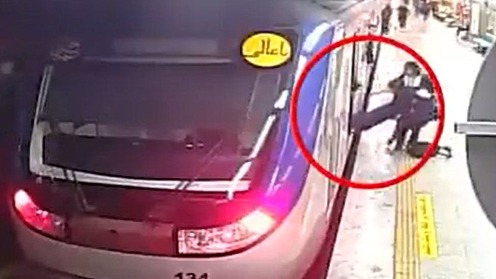 CCTV footage posted by Iran's state news agency, Irna, showing Armita Geravand, 16, being pulled unconscious from a metro train at Tehran's Shohada station on 1 October 2023