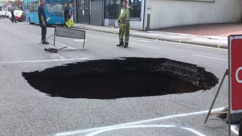 'Absolutely huge' sinkhole appears on Walsall road BBC News