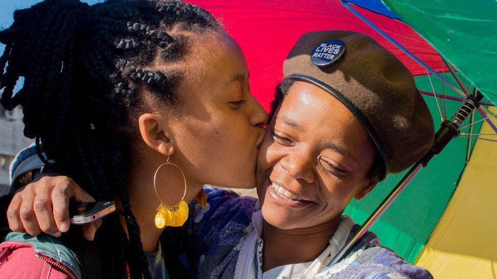 Woman kissing at Namibian gay pride