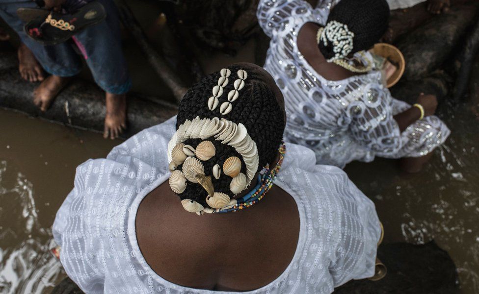 A priestess with shells in her hair at the Osun-Osogbo Festival in Osogbo, Nigeria - Friday 17 August 2018