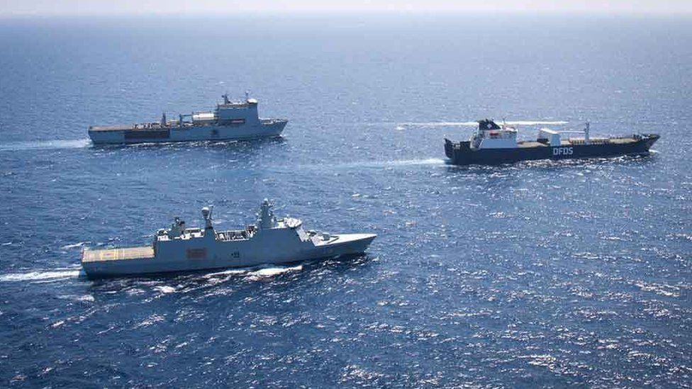 RFA Mounts Bay (top left), with a Danish warship, escorts a Danish transport vessel through the Mediterranean, 31 August 2016