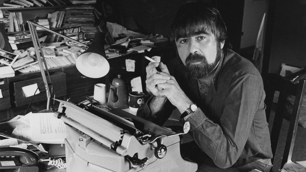Portrait of writer Alan Bleasdale working at his typewriter, August 1983