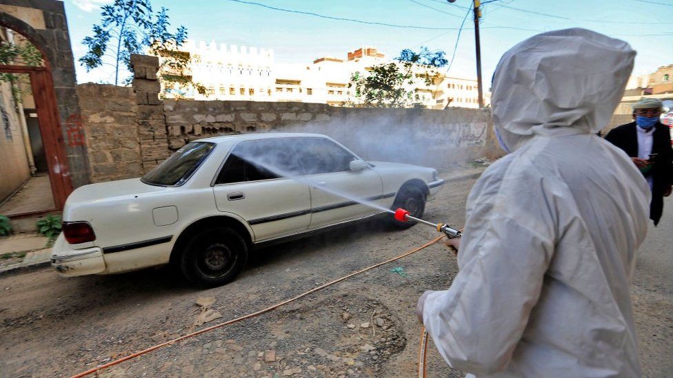 A car is disinfected in Yemen
