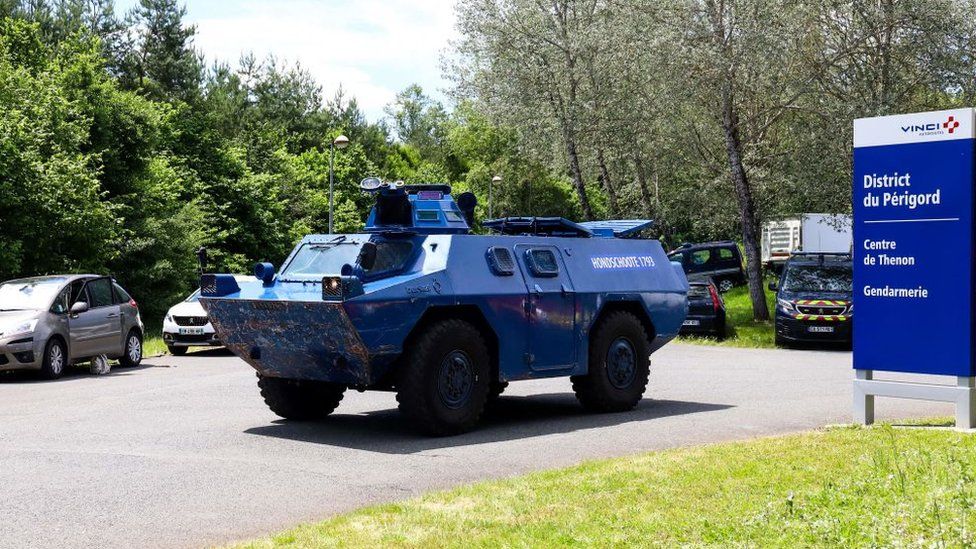 An armoured vehicle takes part in the search for the gunman in the Dordogne region, May 2021