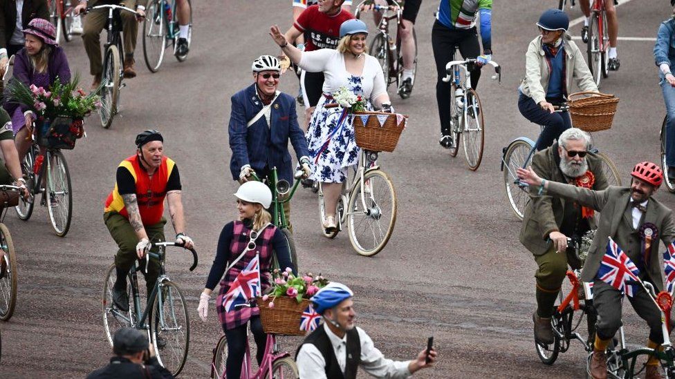 Cyclists parade during the Platinum Pageant in London