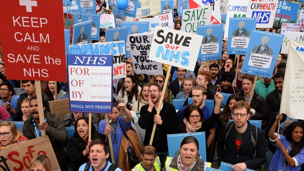Demonstrators at a rally and protest march for junior doctors in London