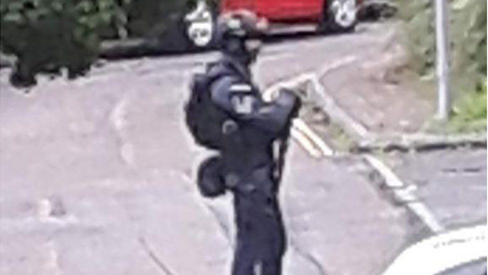 armed policeman in Andover