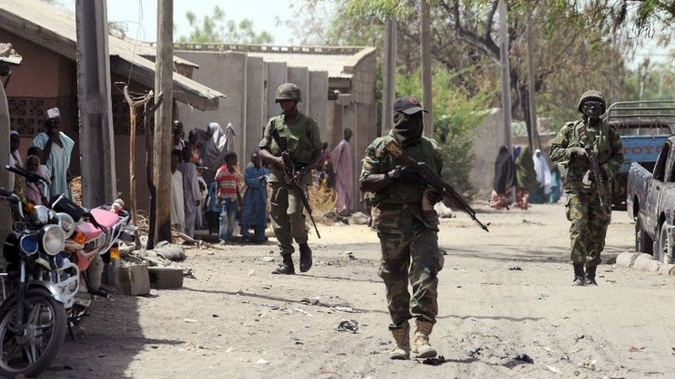 Nigerian soldiers patrol the streets of the town of Baga, Borno state. File photo