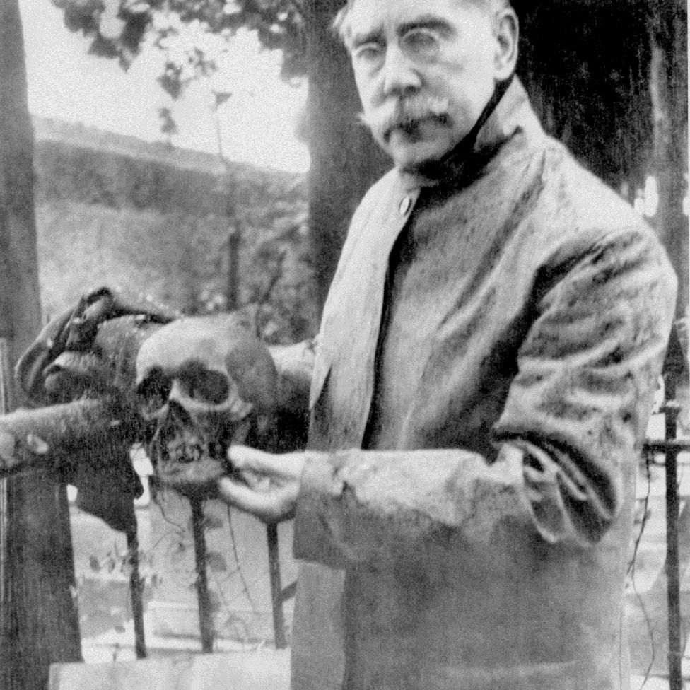 US Consul to Genoa, William Henry Bishop, holding Smithson's skull during exhumation