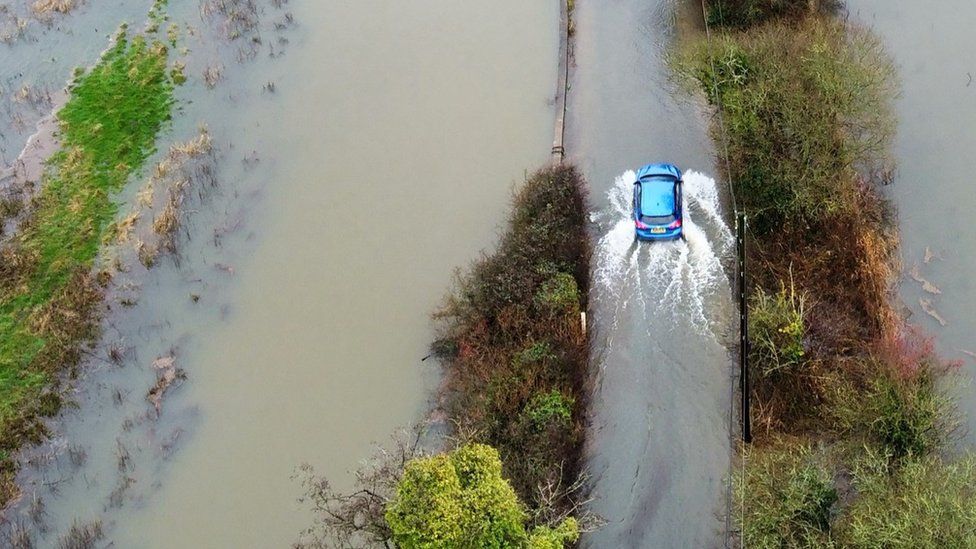 Drone shot of car in flooding in the Wensum Valley