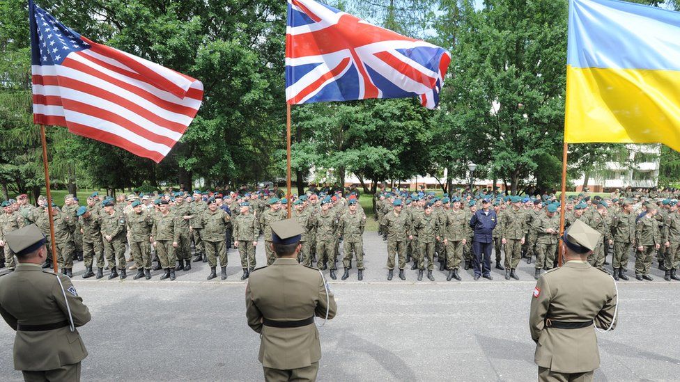Flags held up by soldiers during opening ceremony ,6 June 2016