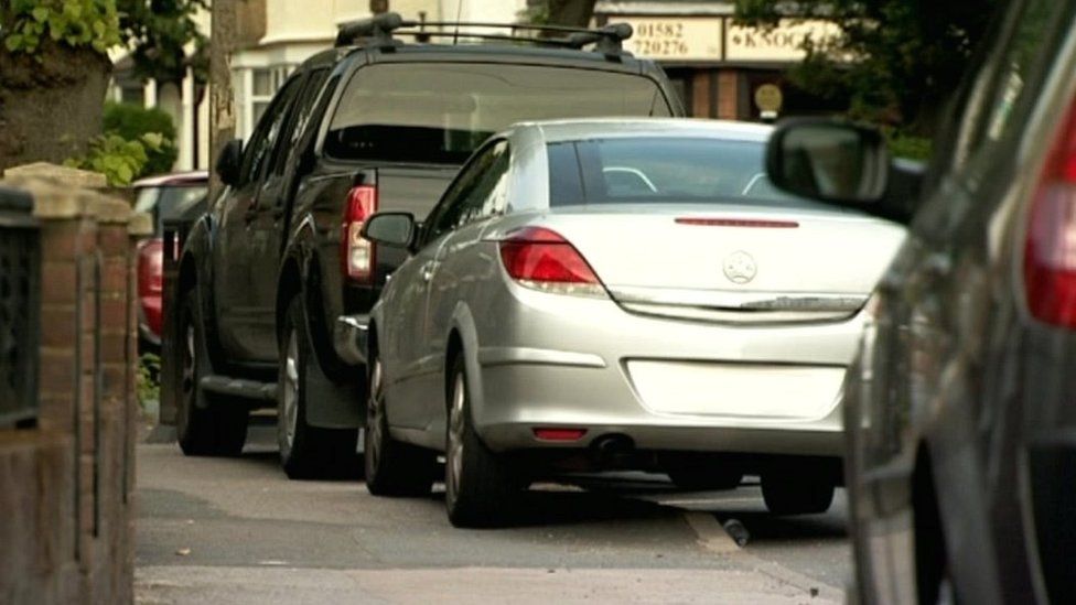 Parked cars on pavements