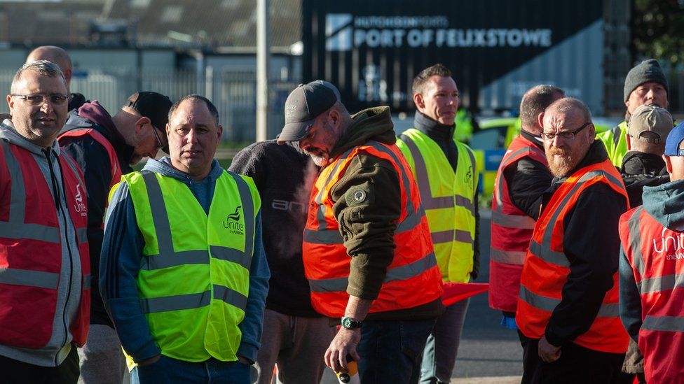 Striking dock workers picket outside the main gate of the port on September 27, 2022 in Felixstowe,