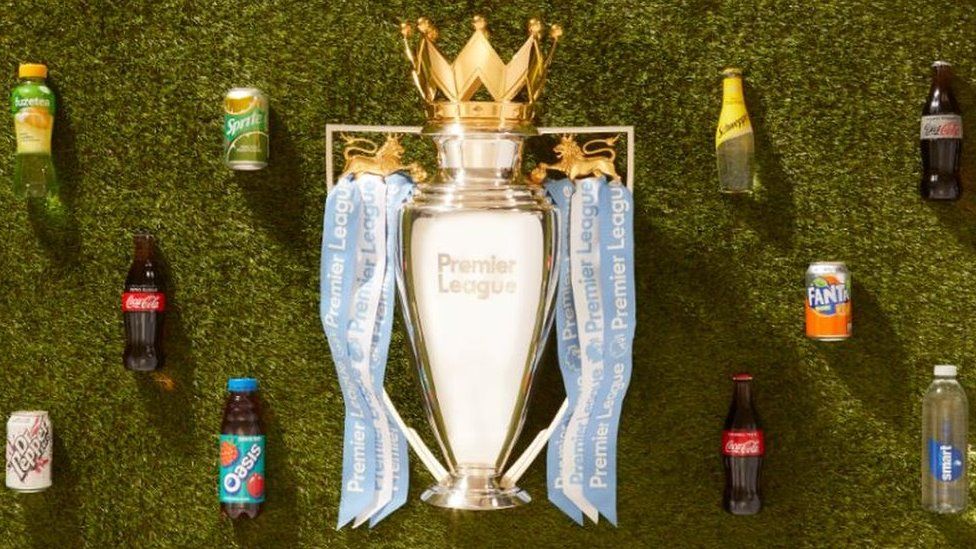 Premier League trophy and Coca-Cola brands