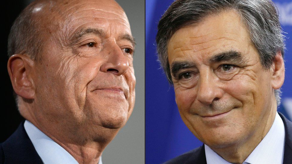 French conservative rivals Alain Juppe (L) and Francois Fillon
