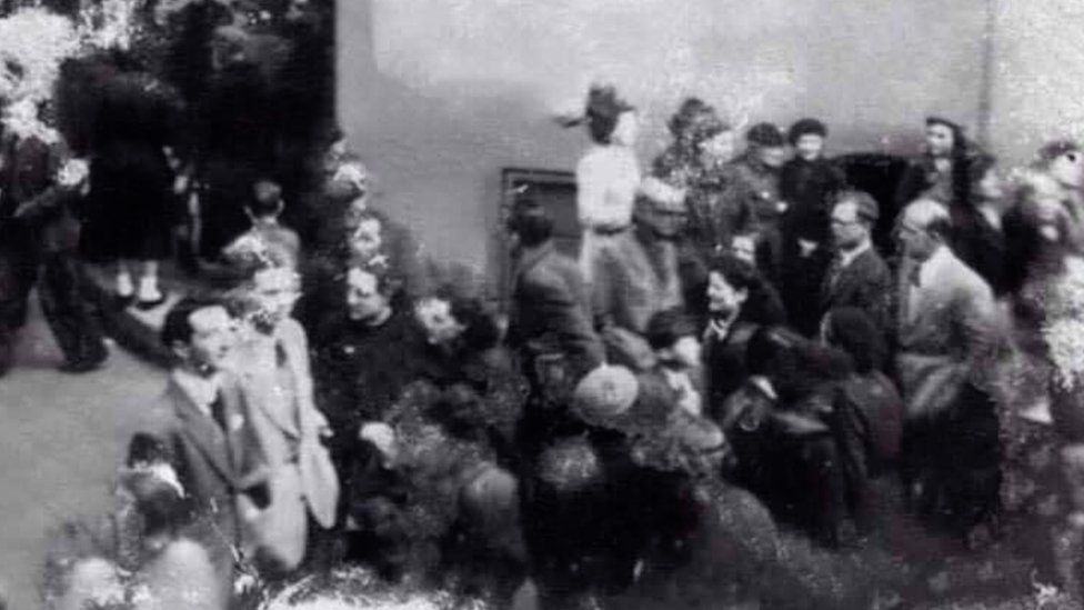Old images captures the crowd that had gathered on Irish Street to see what had happened