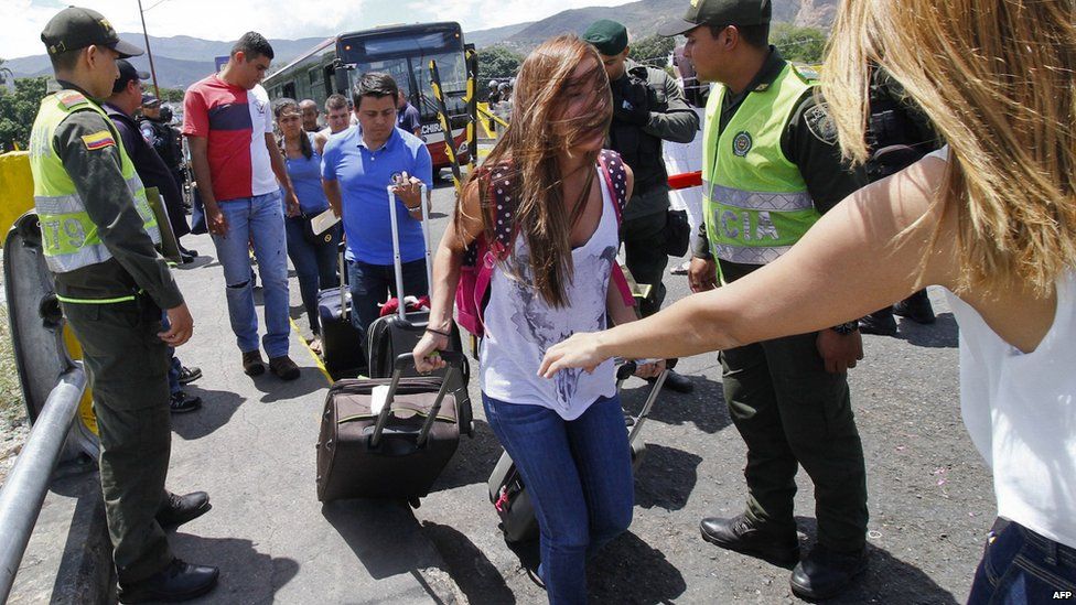 Colombians return to their home country after being deported by Venezuela