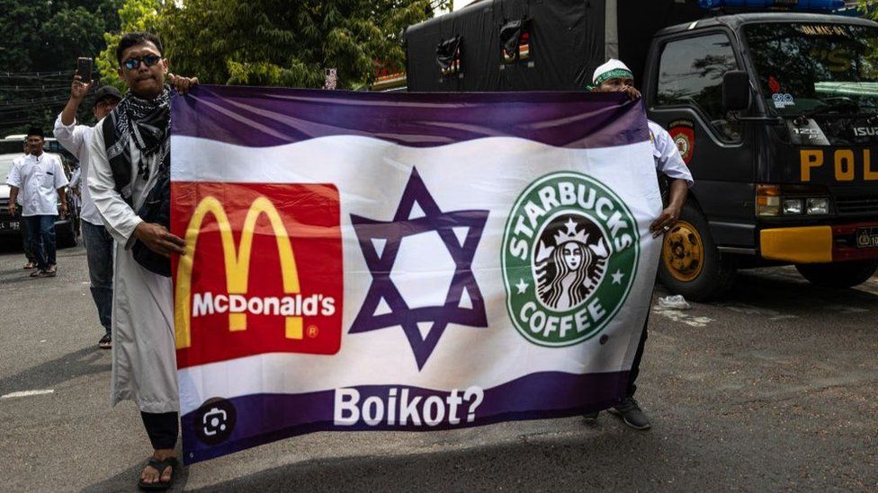 Indonesia protesters demand the closure of McDonald's, KFC, Burger King, Starbucks, and Pizza HUT outlets because they are considered to support Israel in attacking militant group Hamas in Palestine on October 17, 2023 in Surabaya, Indonesia.