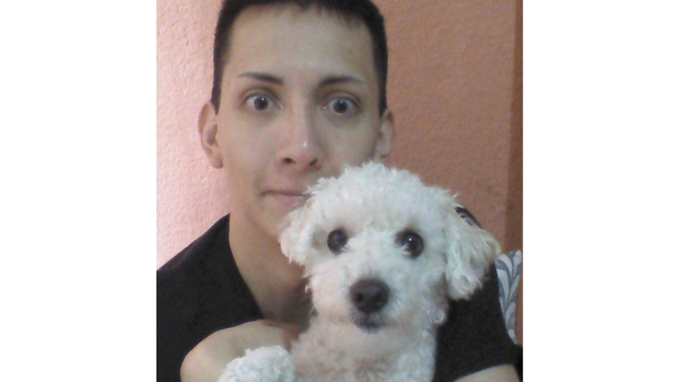 Cristian Ibarra Santillan and his dog, Oso