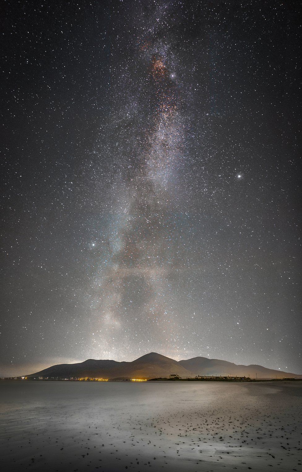 The Milky Way over the Mourne mountains as seen from Tyrella Beach in County Down