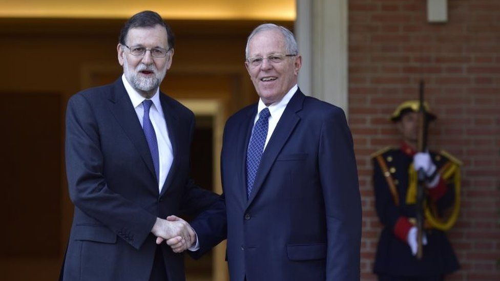 Spanish Prime Minister Mariano Rajoy (L) shakes hands with the Peru's President Pedro Pablo Kuczynski at the Moncloa Palace in Madrid on June 12, 2017.