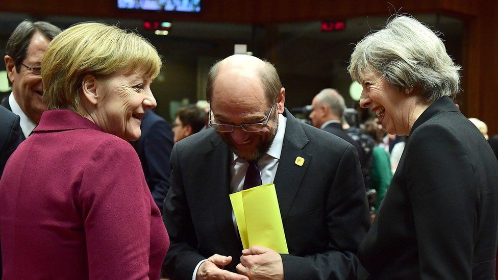 Theresa May with Angela Merkel and Martin Schulz, speaker of the European Parliament