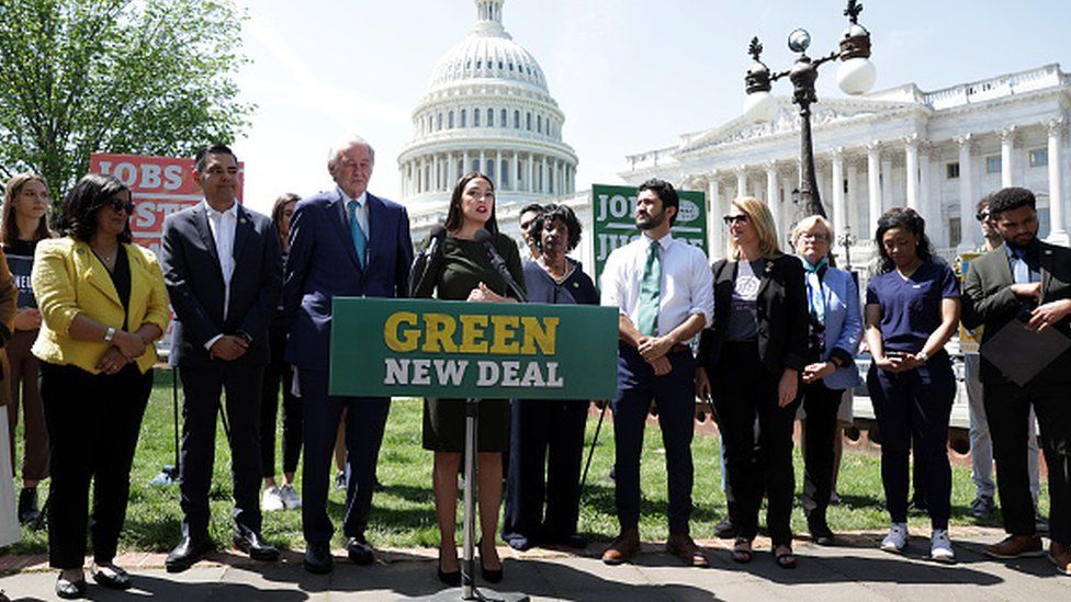 Alexandria Ocasio-Cortez and other participants in a news conference on the Green New Deal