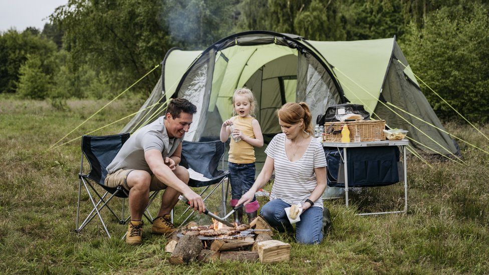 A family at a camp site