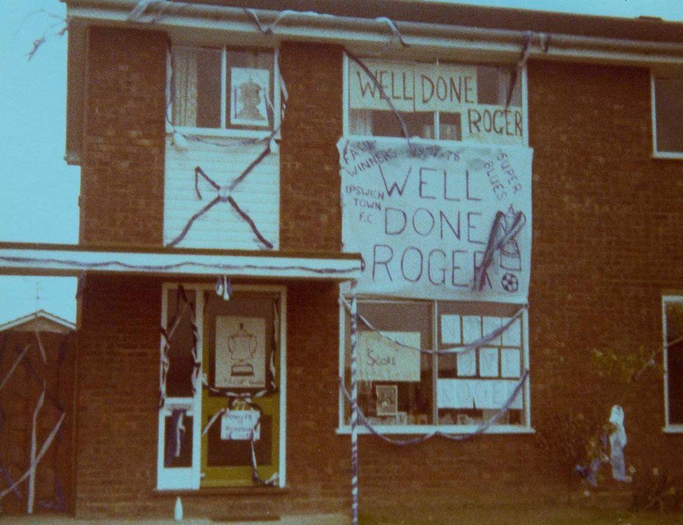 Roger Osborne's house draped in ribbons and banners