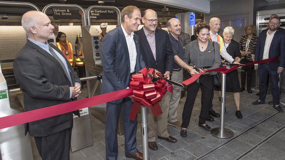 The Metropolitan Transportation Authority (MTA) officials cut a red bow to open the new WTC Cortlandt subway station on Saturday, September 8, 2018.