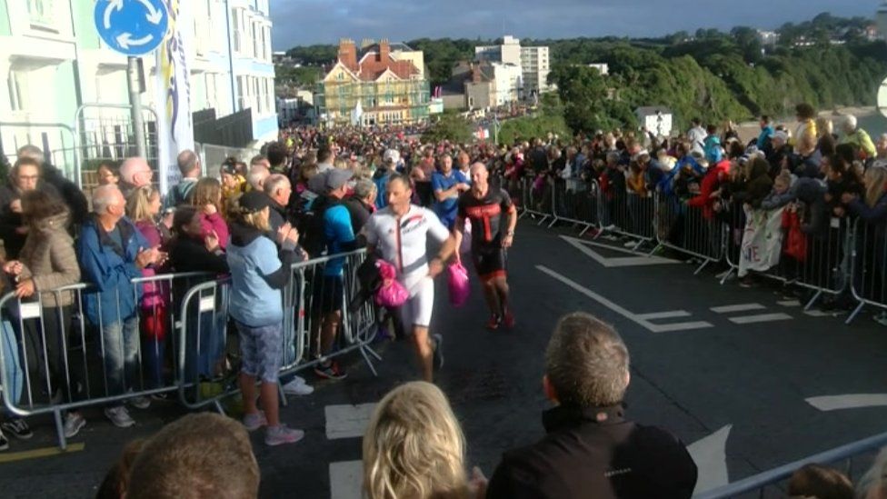 People lined the streets in Tenby to watch the seventh Ironman Wales