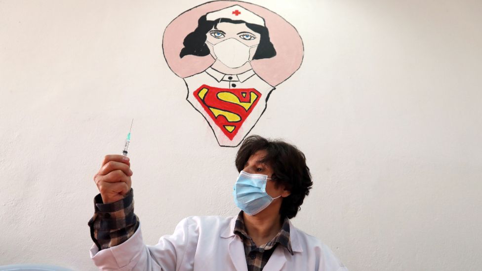 A nurse holding up a syringe in Tunis, Tunisia - Monday 3 May 2021